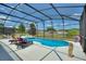Inviting screened pool with ample space for relaxation and entertainment at 5204 Oakbourne Ave, Davenport, FL 33837