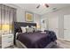 Comfortable main bedroom with king-size bed and plenty of natural light at 5204 Oakbourne Ave, Davenport, FL 33837