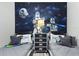Twin bedroom with Star Wars mural, nightstands, and gray bedding at 5204 Oakbourne Ave, Davenport, FL 33837