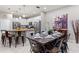 Elegant dining room with dark wood table and seating for six at 5204 Oakbourne Ave, Davenport, FL 33837