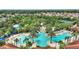 Large community pool complex with multiple pools and water features at 5204 Oakbourne Ave, Davenport, FL 33837