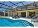 Inviting pool and patio area with ample seating for entertaining at 5204 Oakbourne Ave, Davenport, FL 33837