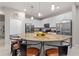 Modern kitchen with island, stainless steel appliances and granite countertops at 5204 Oakbourne Ave, Davenport, FL 33837