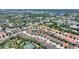 Aerial view of house and surrounding neighborhood, showcasing location and community at 5204 Oakbourne Ave, Davenport, FL 33837