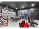 Game room with air hockey, basketball game, and comfortable seating at 5204 Oakbourne Ave, Davenport, FL 33837