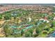 Aerial view of community with resort-style pool and lazy river at 5204 Oakbourne Ave, Davenport, FL 33837