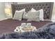 Close-up of the main bedroom's luxurious bedding and tray at 5204 Oakbourne Ave, Davenport, FL 33837