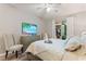 Comfortable bedroom with a queen-size bed and a private balcony at 5204 Oakbourne Ave, Davenport, FL 33837