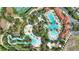 Aerial view of community pool and surrounding landscape at 5204 Oakbourne Ave, Davenport, FL 33837