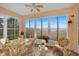 Sunroom with seating area and view of backyard at 4319 Dinner Lake Blvd, Lake Wales, FL 33859