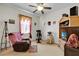 Room includes recliner, exercise bike, and entertainment center at 4319 Dinner Lake Blvd, Lake Wales, FL 33859
