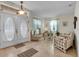 Bright and spacious living room with tiled floors and two comfy sofas at 4319 Dinner Lake Blvd, Lake Wales, FL 33859