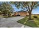One-story house with attached garage and manicured lawn at 4319 Dinner Lake Blvd, Lake Wales, FL 33859