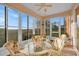 Bright sunroom with table and chairs, offering a relaxing space at 4319 Dinner Lake Blvd, Lake Wales, FL 33859