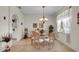 Dining room with glass table and six chairs, located near the kitchen at 4319 Dinner Lake Blvd, Lake Wales, FL 33859