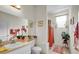 Bright bathroom with tub, shower and single vanity at 4319 Dinner Lake Blvd, Lake Wales, FL 33859
