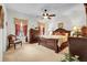 Elegant Primary bedroom with a king-size bed and plenty of light at 4319 Dinner Lake Blvd, Lake Wales, FL 33859