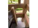 Interior stairwell with architectural details and views of landscaping at 5500 Metrowest Blvd # 304, Orlando, FL 32811