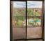 Balcony view of a community pool and lush landscaping at 5500 Metrowest Blvd # 304, Orlando, FL 32811