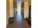 Interior hallway with access to units, clean and well-maintained at 5500 Metrowest Blvd # 304, Orlando, FL 32811