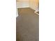 New neutral-toned carpeting throughout the living area at 5500 Metrowest Blvd # 304, Orlando, FL 32811