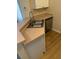Kitchen with double sink and dishwasher at 5500 Metrowest Blvd # 304, Orlando, FL 32811