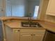 Kitchen features a double sink and ample counter space at 5500 Metrowest Blvd # 304, Orlando, FL 32811