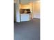 Living room with kitchen and breakfast bar at 5500 Metrowest Blvd # 304, Orlando, FL 32811