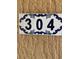 Tile with the unit number 304, indicating the specific unit at 5500 Metrowest Blvd # 304, Orlando, FL 32811