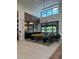 Relaxing clubhouse lounge with comfortable seating and large windows at 2590 Cliff Way, Saint Cloud, FL 34771