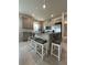 Modern kitchen with an island and stainless steel appliances at 2590 Cliff Way, Saint Cloud, FL 34771