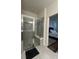 Bathroom with a large walk-in shower and built-in seat at 2590 Cliff Way, Saint Cloud, FL 34771