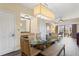Dining area with glass table and seating for four at 12544 Floridays Resort Dr # 503-B, Orlando, FL 32821