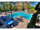 Large resort pool with plenty of lounge chairs at 12544 Floridays Resort Dr # 503-B, Orlando, FL 32821