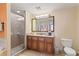 Bathroom with walk-in shower and double vanity at 12544 Floridays Resort Dr # 503-B, Orlando, FL 32821