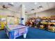 Game room with air hockey and various racing games at 12544 Floridays Resort Dr # 503-B, Orlando, FL 32821