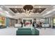 Elegant resort lobby with seating and concierge desk at 12544 Floridays Resort Dr # 503-B, Orlando, FL 32821