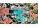 Large pool area with multiple pools and loungers at 12544 Floridays Resort Dr # 503-B, Orlando, FL 32821