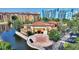Resort-style community with lake and building views at 12544 Floridays Resort Dr # 503-B, Orlando, FL 32821