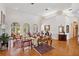 Open living area showcasing hardwood floors and views to the dining room at 1912 Belford Ct, Maitland, FL 32751