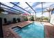 Private screened pool with brick patio and lounge chairs at 4611 Terrasonesta Dr, Davenport, FL 33837