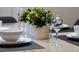 Table setting with centerpiece at 4611 Terrasonesta Dr, Davenport, FL 33837
