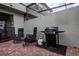Relaxing patio with grill and lounge chairs at 4611 Terrasonesta Dr, Davenport, FL 33837