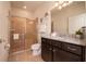 Clean bathroom with shower and granite vanity at 4611 Terrasonesta Dr, Davenport, FL 33837