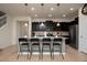 Kitchen with breakfast bar and four stools at 4611 Terrasonesta Dr, Davenport, FL 33837