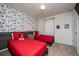 Mickey Mouse-themed bedroom with twin beds and a playful atmosphere at 4611 Terrasonesta Dr, Davenport, FL 33837