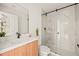 Clean bathroom with a large walk-in shower and modern vanity at 6368 Chorus Dr, Mascotte, FL 34753