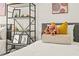 bedroom with twin beds, shelving, and decor at 6368 Chorus Dr, Mascotte, FL 34753