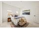 Main bedroom with a queen bed and stylish decor at 6368 Chorus Dr, Mascotte, FL 34753