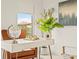 Modern home office featuring a white desk and a comfortable chair at 6368 Chorus Dr, Mascotte, FL 34753